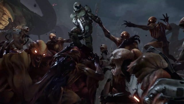 Doom 2016 : le Doom Slayer est submergé par une horde de Diablotins.