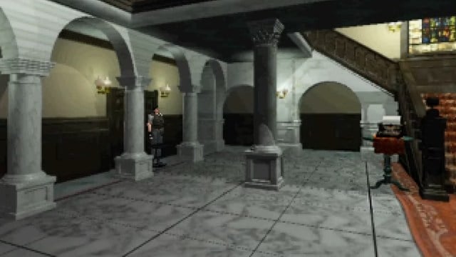 Resident Evil : Chris Redfield se tient dans l'entrée principale du Spencer Mansion.