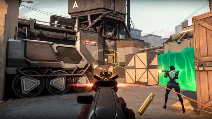 A VALORANT player aiming down their weapon site with a gas wall to the right