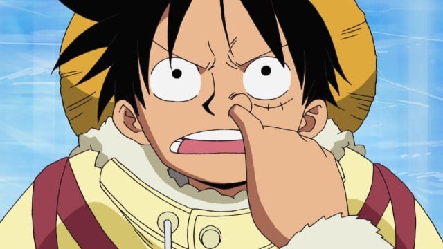 Luffy se curant le nez dans One Piece