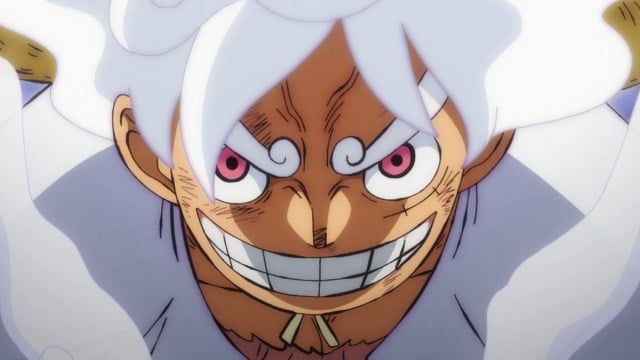 Luffy en Gear Five souriant de manière menaçante dans One Piece